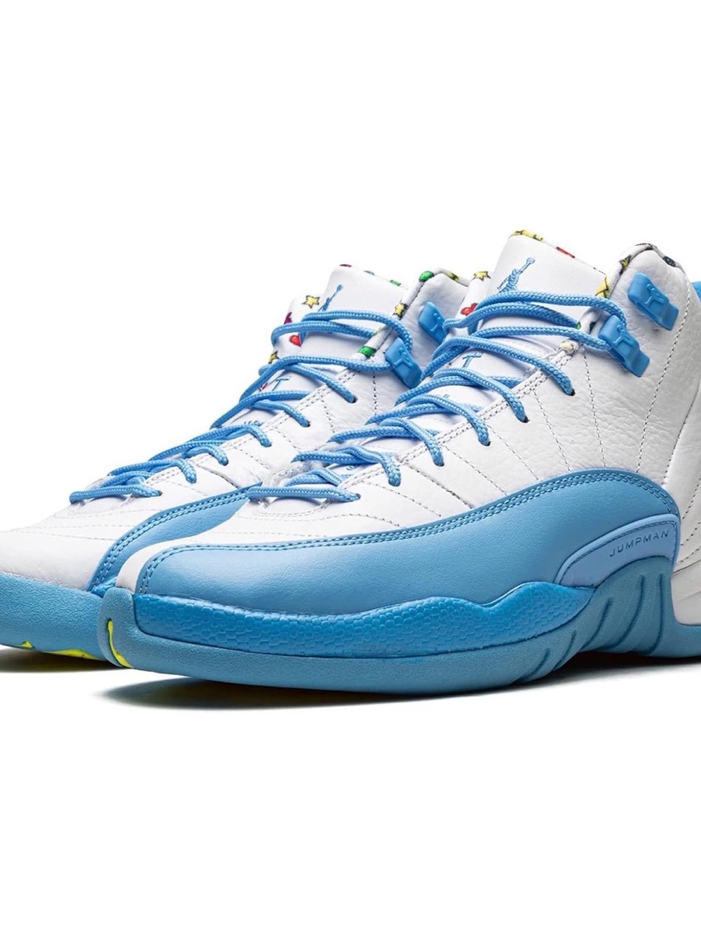 Air Jordan Retro 12 in White and Light Blue with Multicolor Accents. Youth Sz.7